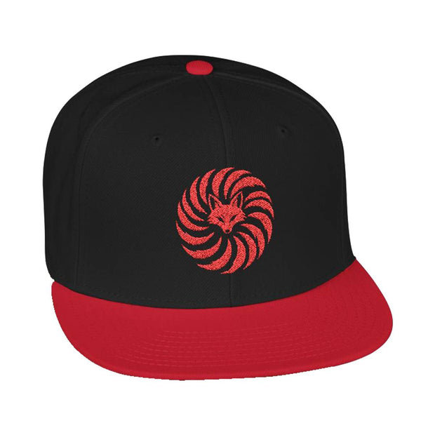 Snapback cap with an embroidered emblem representing a kitsune, front