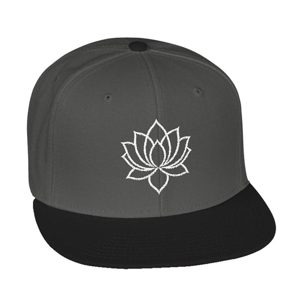 Snapback cap with an embroidered emblem representing a lotus, front