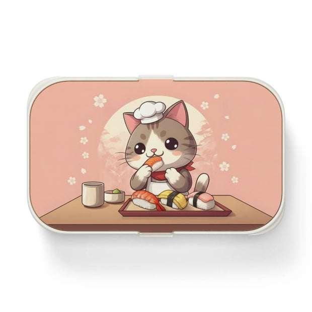 Bento box with a manga style design representing a cat eating sushi, front