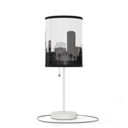 Lamp on a stand with Sapporo's skyline design, right