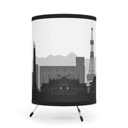 Tripod lamp with Sapporo's skyline design, left