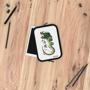Laptop and Tablet Case - Green and Yellow Dragon With "Guardian" Character - on table - 7 inch