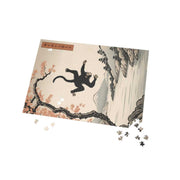 Jigsaw puzzle illustrating the Japanese proverb "Even monkeys fall", pieces